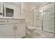 Bathroom featuring vanity with cabinets, toilet and a glass enclosed shower stall at 125 S Prestwick Way # 41, Mooresville, NC 28115
