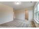 Another angle of this bedroom with natural light that streams through two doorways and a large window at 125 S Prestwick Way # 41, Mooresville, NC 28115