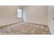 Comfortable bedroom with carpet flooring, a window, and neutral-toned walls at 125 S Prestwick Way # 41, Mooresville, NC 28115