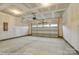 Spacious garage with an automatic door opener and concrete floor at 125 S Prestwick Way # 41, Mooresville, NC 28115