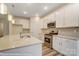 Modern kitchen featuring stainless steel appliances, center island, and gorgeous countertops at 125 S Prestwick Way # 41, Mooresville, NC 28115