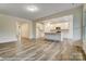 The spacious kitchen has a center island, pendant lighting, and modern finishes at 125 S Prestwick Way # 41, Mooresville, NC 28115