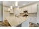 Gorgeous kitchen with stainless steel appliances, large island, and plenty of cabinet space at 125 S Prestwick Way # 41, Mooresville, NC 28115