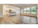 Open-concept kitchen featuring white cabinets, stainless appliances, and a kitchen island at 125 S Prestwick Way # 41, Mooresville, NC 28115