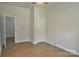 Bedroom with wood-look flooring and white trim at 1277 Eden Dr # 18, Chester, SC 29706