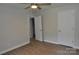 Bright bedroom with a ceiling fan, wood-look flooring, and white trim at 1277 Eden Dr # 18, Chester, SC 29706