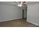 Spacious living room with hardwood floors, ceiling fan, and a gray painted wall at 1277 Eden Dr # 18, Chester, SC 29706