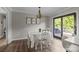 Dining area with backyard deck access and decorative wall art at 130 Johnson Dairy Rd, Rockwell, NC 28138