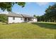 Charming home with manicured front yard, featuring a covered front porch and inviting curb appeal at 130 Johnson Dairy Rd, Rockwell, NC 28138