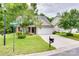 Charming brick-and-siding home with well-maintained lawn and a one-car garage at 1532 Andora Dr, Rock Hill, SC 29732