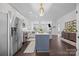 Well-equipped kitchen featuring sleek appliances, stylish backsplash, and ample storage at 15913 Trenton Place Rd, Huntersville, NC 28078