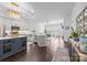 Spacious open-concept kitchen featuring stainless steel appliances and island seating at 15913 Trenton Place Rd, Huntersville, NC 28078