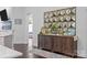 Bright living area with stylish furnishings, open to kitchen with hardwood floors at 15913 Trenton Place Rd, Huntersville, NC 28078