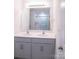 Bathroom with double sink vanity and a glass enclosed shower at 1600 Gaston Mountain Dr, Dallas, NC 28034