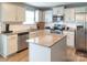 Bright kitchen featuring stainless steel appliances, granite countertops, and a central island at 1600 Gaston Mountain Dr, Dallas, NC 28034