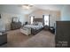 Spacious main bedroom with vaulted ceiling and comfortable seating at 1600 Gaston Mountain Dr, Dallas, NC 28034