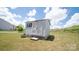 Exterior view of white shed, showing clean and functional outdoor storage at 1600 Gaston Mountain Dr, Dallas, NC 28034