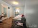 Bright bedroom with a twin bed, hardwood floors, and ample natural light from the window at 1922 Salem Church Rd, Lincolnton, NC 28092