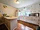 Bright kitchen with white cabinets, stainless steel appliances, and plenty of natural light at 1922 Salem Church Rd, Lincolnton, NC 28092