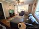Bright and cozy living room featuring hardwood floors and an open view to the kitchen at 1922 Salem Church Rd, Lincolnton, NC 28092