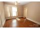 Comfortable bedroom with hardwood floors, and large bright windows at 206 Rose Ter, Wadesboro, NC 28170