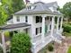 Elegant home boasting expansive verandas, grand columns, and a well-maintained exterior at 206 Rose Ter, Wadesboro, NC 28170