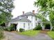 Charming exterior featuring a covered carport, lush landscaping, and a well-maintained yard at 206 Rose Ter, Wadesboro, NC 28170