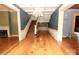 Inviting foyer featuring a grand staircase, hardwood floors, and classic architectural details at 206 Rose Ter, Wadesboro, NC 28170