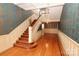Grand foyer with hardwood floors, decorative walls, and an elegant staircase at 206 Rose Ter, Wadesboro, NC 28170