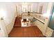 Spacious home foyer featuring a wooden staircase and decorative wall finishes at 206 Rose Ter, Wadesboro, NC 28170