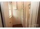 Hallway featuring built-in cabinets and natural light at 206 Rose Ter, Wadesboro, NC 28170