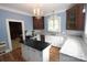 Kitchen featuring an island, stainless steel appliances, and white countertops at 206 Rose Ter, Wadesboro, NC 28170