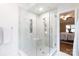 Stylish bathroom featuring a glass-enclosed shower with modern fixtures and tiled walls at 211 Southfork Dr, Belmont, NC 28012