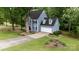 Beautiful home with well-maintained lawn and attached two car garage at 211 Southfork Dr, Belmont, NC 28012