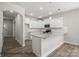 Modern kitchen featuring stainless steel appliances, granite countertops, and a breakfast bar at 215 Lake George Dr, Shelby, NC 28152