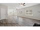 Bright and airy living room featuring modern floors and an open layout at 215 Lake George Dr, Shelby, NC 28152