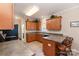 Kitchen with wood cabinets, countertops and a convenient breakfast bar seating area at 2333 Wednesbury Ct, Kannapolis, NC 28083