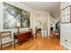 Spacious living area with hardwood floors, decorative columns, and an open layout to the dining area at 2333 Wednesbury Ct, Kannapolis, NC 28083
