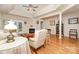 Bright living room with a fireplace, hardwood floors, and access to the outdoors at 2333 Wednesbury Ct, Kannapolis, NC 28083