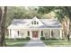 Charming white farmhouse with inviting front porch and lush landscaping, perfect for relaxing and enjoying the outdoors at 237 Roxboro Dr, Mount Gilead, NC 27306