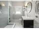 Modern bathroom with glass shower, updated sink, and stylish tile at 255 South Academy St, Mooresville, NC 28115
