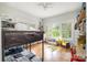 Bright bedroom featuring a bunk bed, hardwood floors, and lots of natural light at 255 South Academy St, Mooresville, NC 28115
