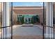Courtyard entrance showcasing a serene fountain, brick architecture, and symmetrical landscaping at 255 South Academy St, Mooresville, NC 28115