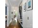 Inviting hallway with staircase leading to upper level at 255 South Academy St, Mooresville, NC 28115
