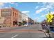 Street view showcasing historic buildings, pedestrian crossings, and street signage at 255 South Academy St, Mooresville, NC 28115