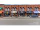 A row of commercial buildings featuring awnings and diverse business facades at 255 South Academy St, Mooresville, NC 28115