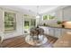 Charming dining area with view to the outside and integrated into the kitchen space at 2658 Manor Stone Way, Indian Trail, NC 28079