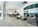 Outdoor lounge area with comfortable seating and a bar overlooking the pool at 2658 Manor Stone Way, Indian Trail, NC 28079