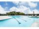 Large community swimming pool with lounge areas and clear blue water at 2658 Manor Stone Way, Indian Trail, NC 28079