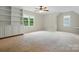 Spacious bedroom with lots of natural light and a ceiling fan at 2725 Cotton Planter Ln, Charlotte, NC 28270